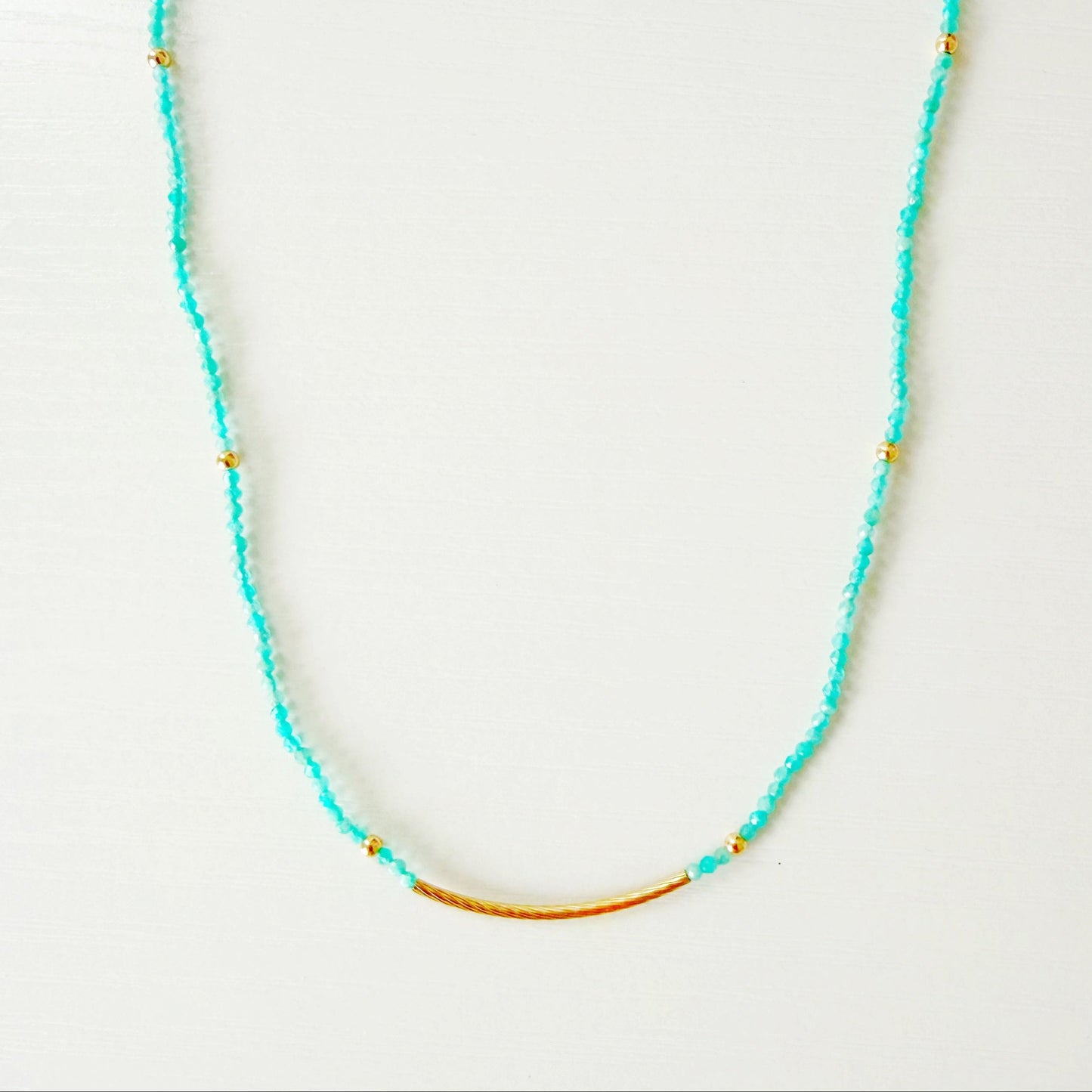 amazonite beaded necklace on a white background