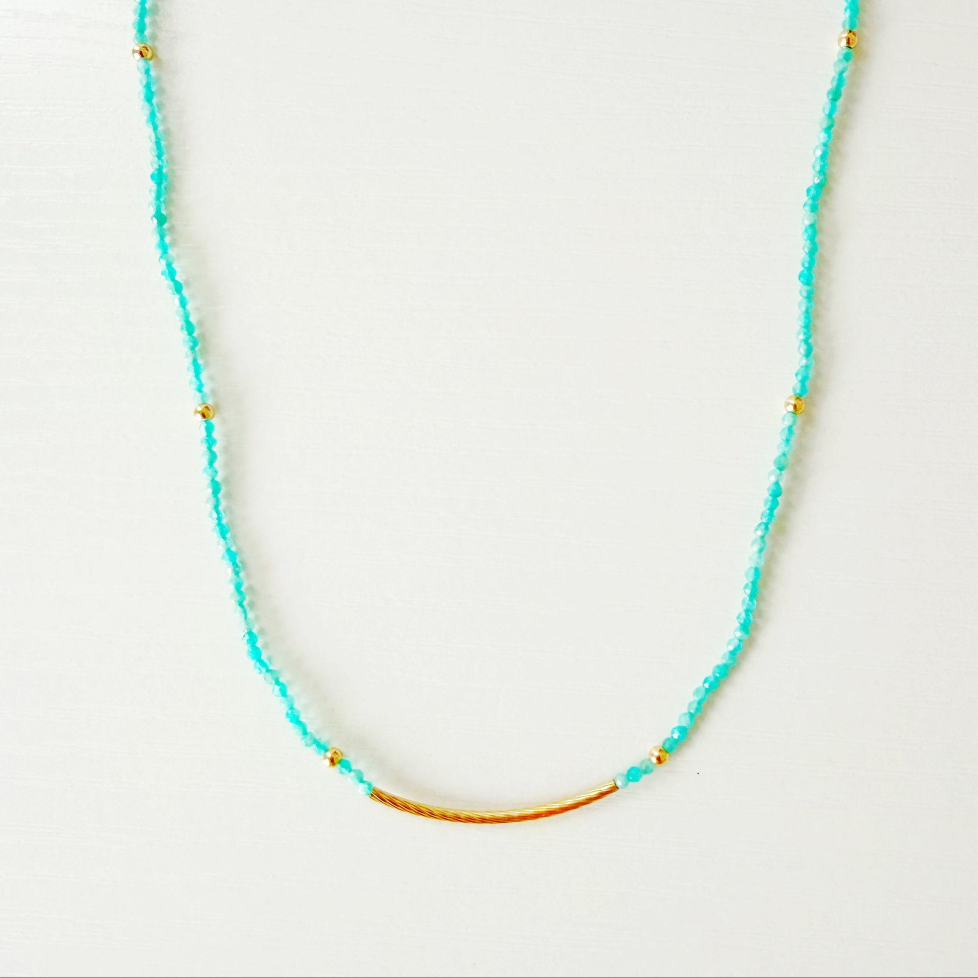 amazonite beaded necklace on a white background