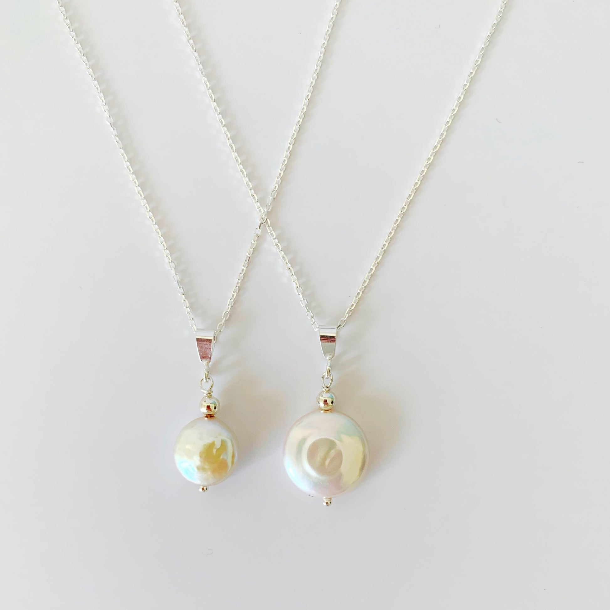 an image of the newport necklace versus the newport gala necklace for size comparison. pictured on a white surface
