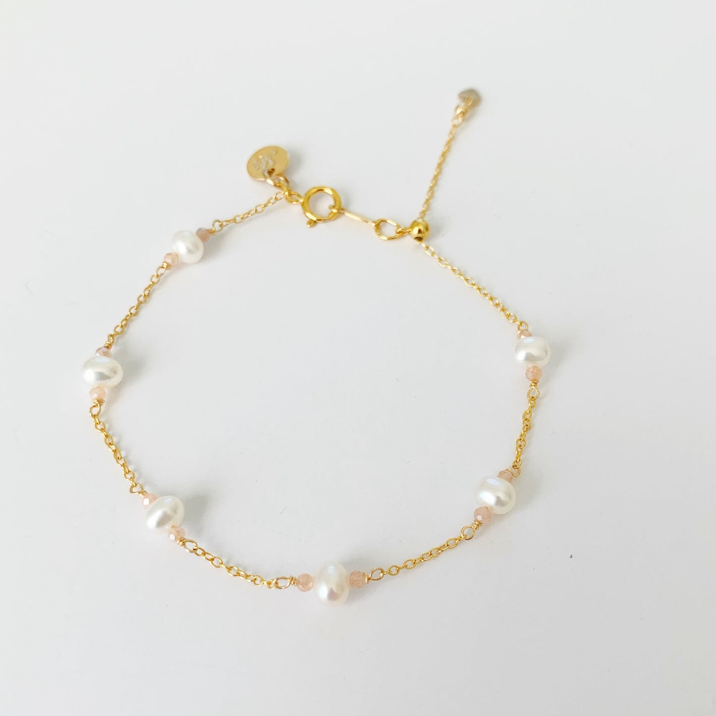 A top view of the barrington bracelet on a white surface