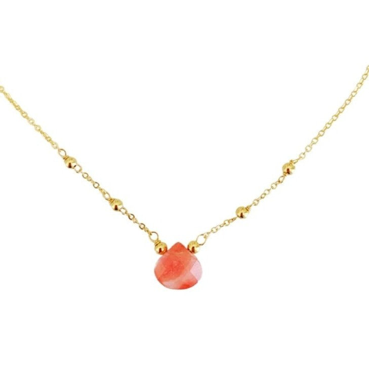 Chatham Necklace by Mermaids and Madeleines features a cherry quartz briolette drop and 14k gold filled beads, findings and chain. This necklace is photographed on a white background